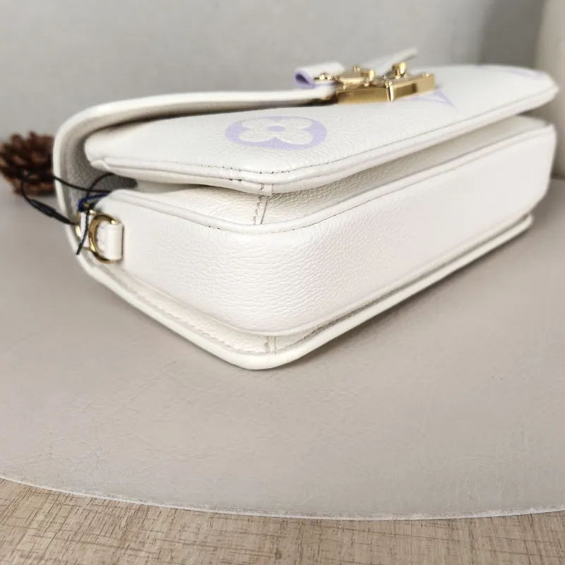 Louis Vuitton Crossbody Bag Pochette Métis East West White · Monogram Empreinte Embossed Calfskin Small 21.5 × 6 × 13.5 cm — detail view 15 of 15