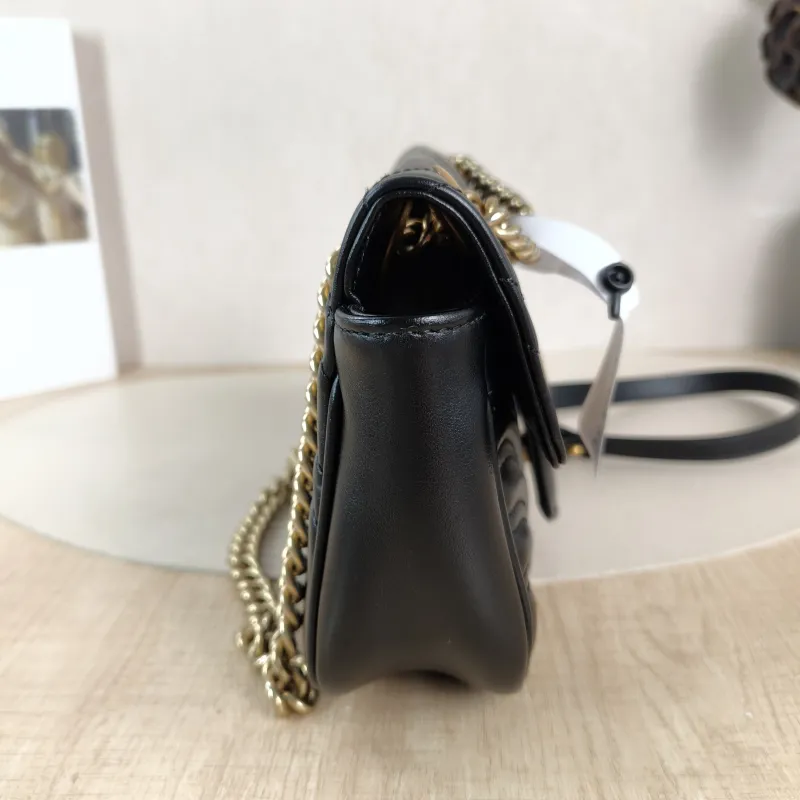 GUCCI Crossbody Bag GG Marmont Small Marmont 22 Black CC alfskin Small 22 × 6 × 13 cm — detail view 1 of 11