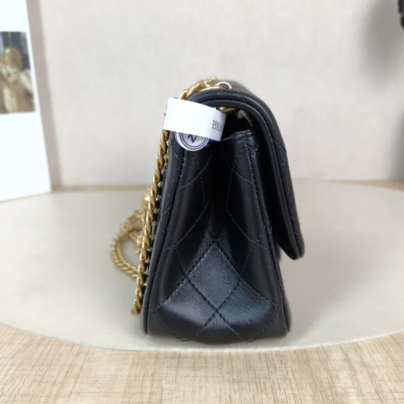 Chanel Crossbody Bag Black with Gold-Tone Hardware Lambskin Mini 17 × 8 × 12 cm — detail view 9 of 13