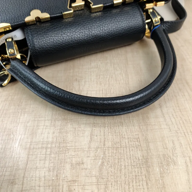 Louis Vuitton Top Handle Bag Capucines Black · Calfskin Medium31.5 × 11 × 20 cm — detail view 1 of 14