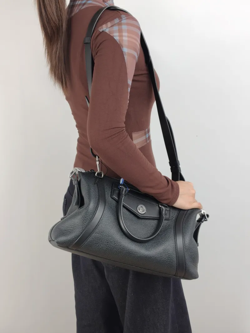 Louis Vuitton Crossbody Bag BIKER Black Lambskin Medium 38 × 15 × 15 cm — on-model view 2 of 3