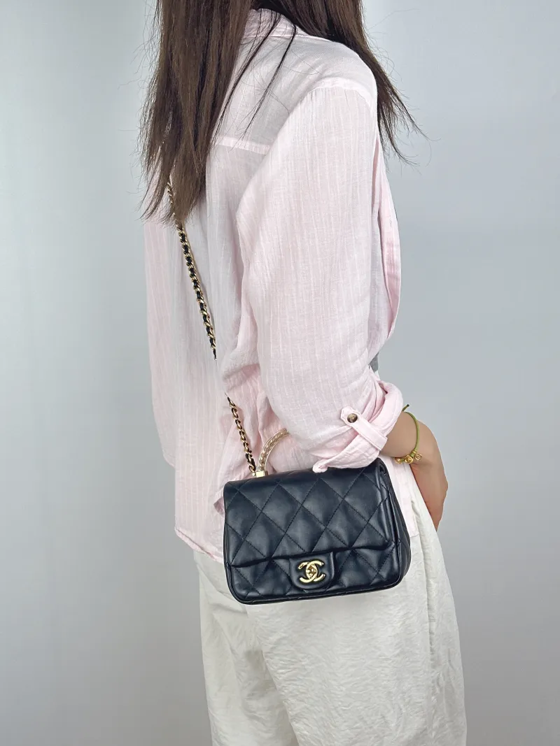 Chanel Crossbody Bag Black Lambskinmini19 × 6 × 12 cm — on-model view 1 of 3