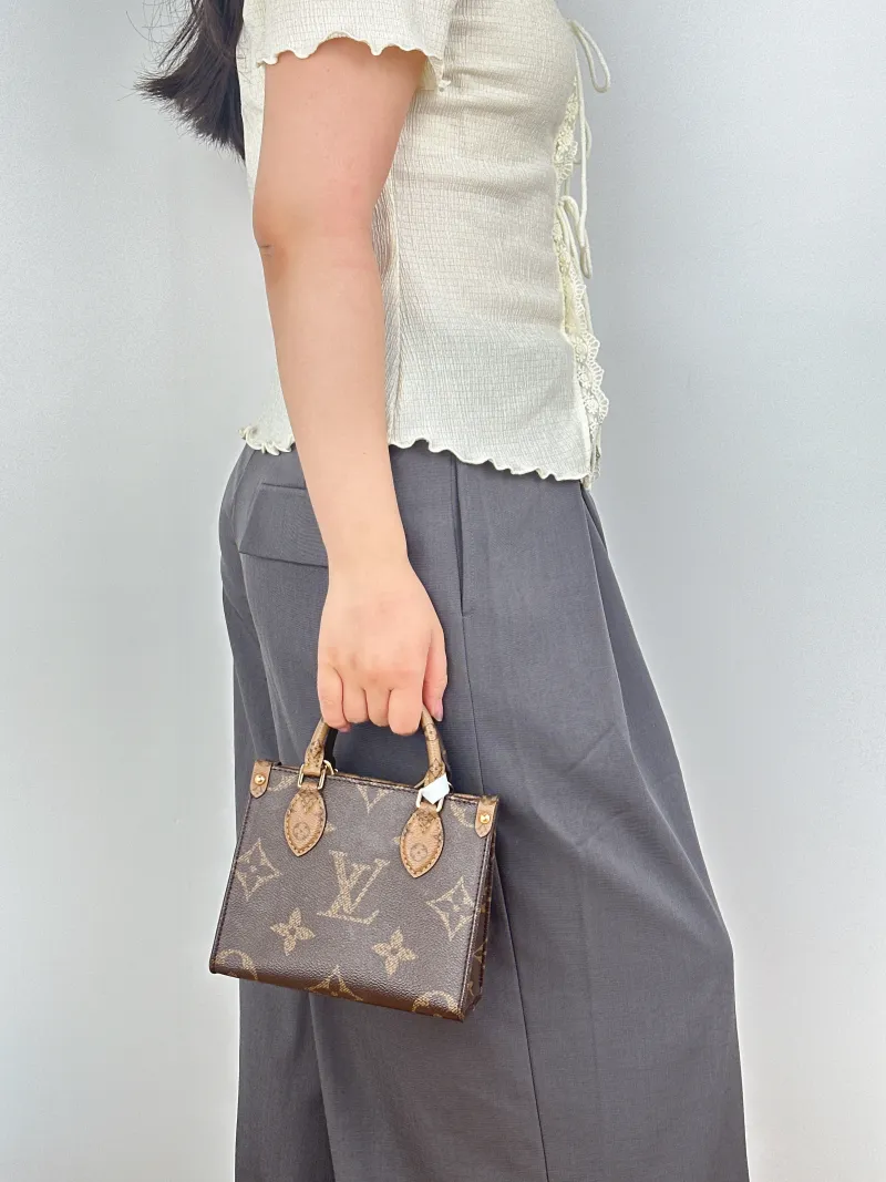Louis Vuitton Crossbody Bag Onthego BB Monogram PVCBB18 × 8.5 × 15 cm — on-model view 3 of 3