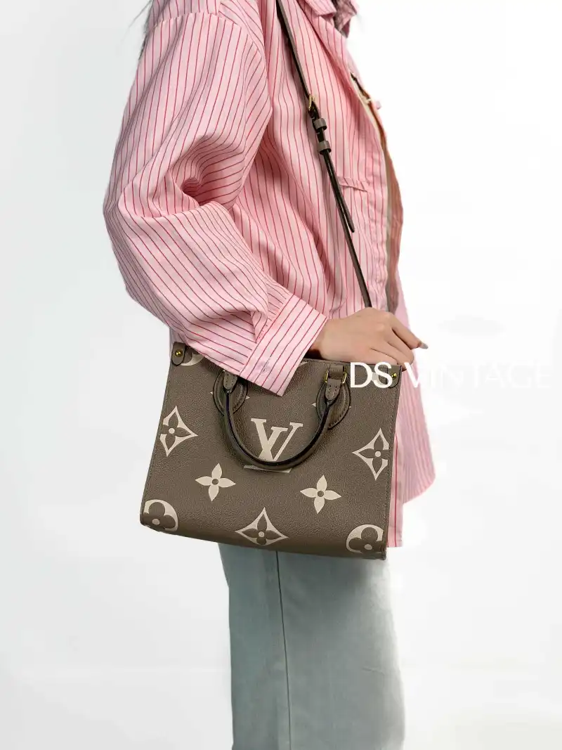 Louis Vuitton Shoulder Bag Onthego · White Empreinte Embossed Calfskin Small25 × 11.5 × 19 cm — on-model view 3 of 3