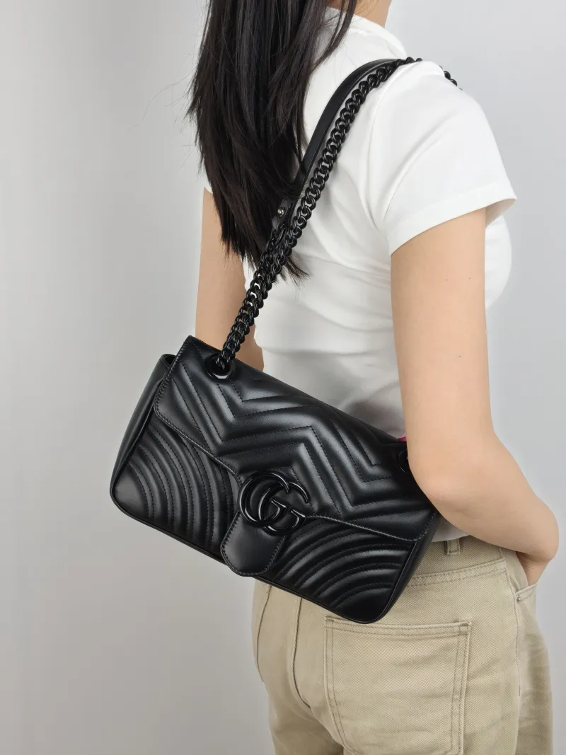 GUCCI Crossbody Bag GG Marmont Medium Marmont 26 So black Black Calfskin Medium 26 × 7 × 15 cm — on-model view 2 of 2
