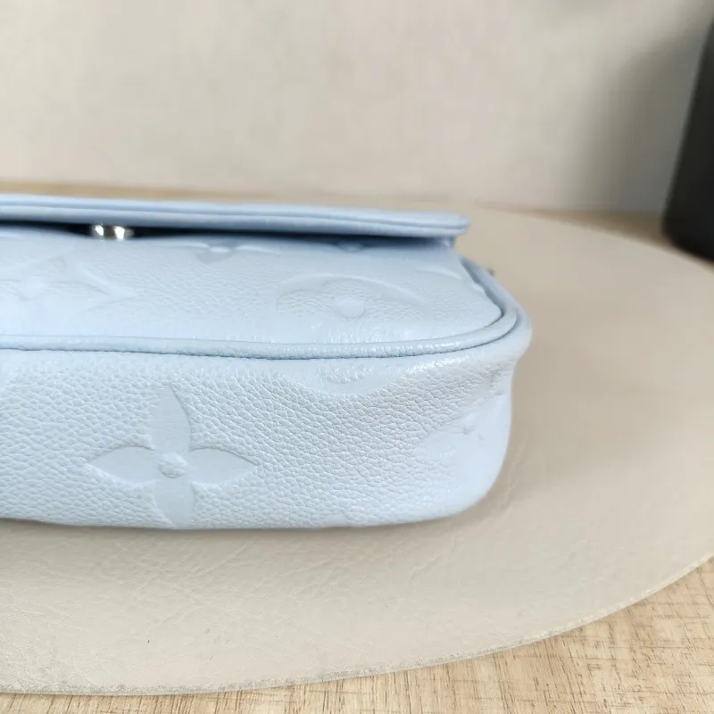 Louis Vuitton Crossbody Bag IVY Blue Empreinte Embossed Calfskin Small 23.5 × 4.3 × 12 cm — detail view 8 of 13
