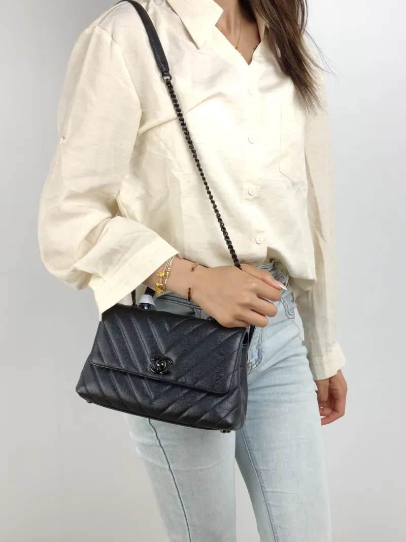 Chanel Top Handle Bag Coco Handle​ v Black Grained Calfskin Small 24 × 10 × 14 cm — on-model view 1 of 2