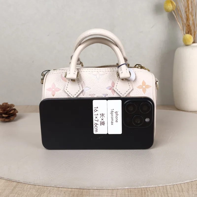 Louis Vuitton Crossbody Bag Speedy Nano Monogram Empreinte Embossed Calfskin nano 16 × 7.5 × 10 cm — cover view 4 of 6