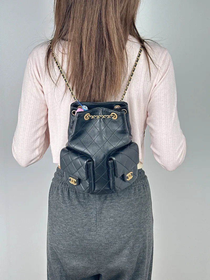 Chanel Backpack25c Backpack Black Lambskin One Size18 × 8 × 24 cm — on-model view 1 of 2