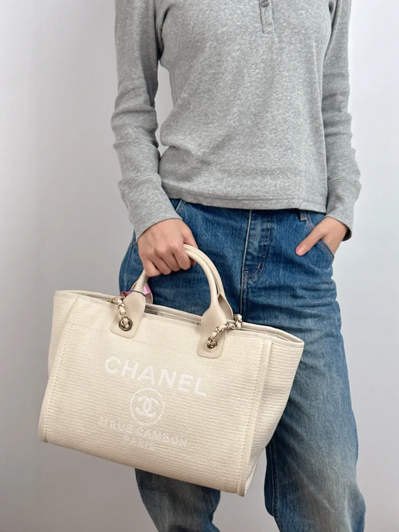 Chanel Shoulder Bag White Canvas One Size 32 × 16 × 23 cm — on-model view 1 of 2