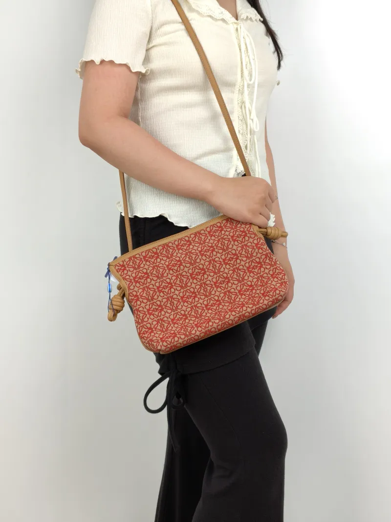 LOEWE Crossbody Bag Flamenco Red Monogram Canvas mini24 × 9 × 18 cm — on-model view 1 of 3
