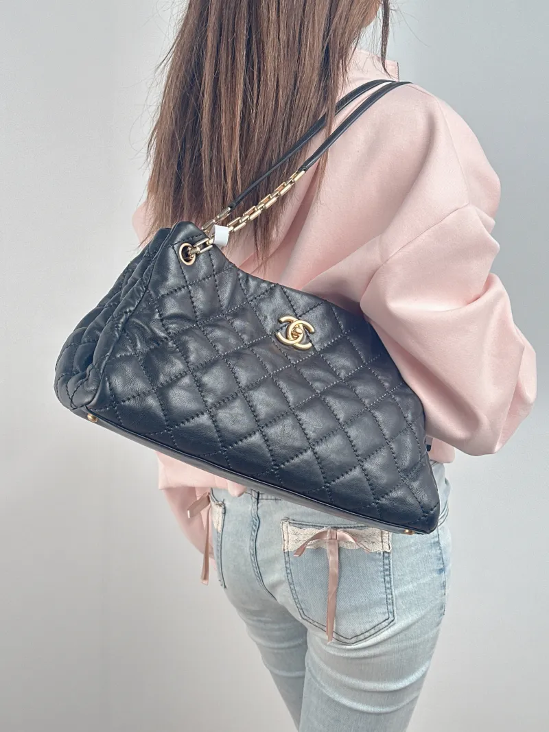Chanel Shoulder Bag tote Black Calfskin One Size 35 × 16 × 20 cm 14 — on-model view 1 of 2