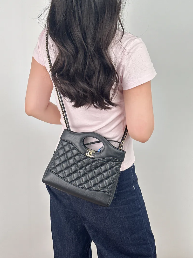 Chanel Crossbody Bag 31Bag Black Calfskin Mini 23 × 5.5 × 22 cm — on-model view 2 of 2