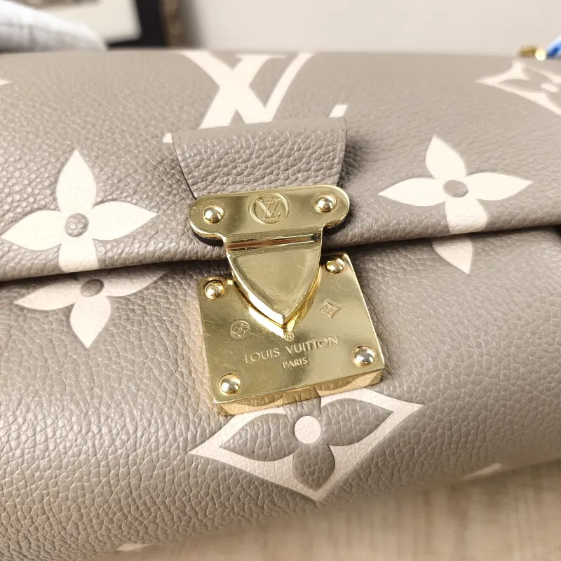 Louis Vuitton Crossbody Bag Favorite Empreinte Embossed Calfskin Monogram Medium24 × 9 × 14 cm — detail view 1 of 18