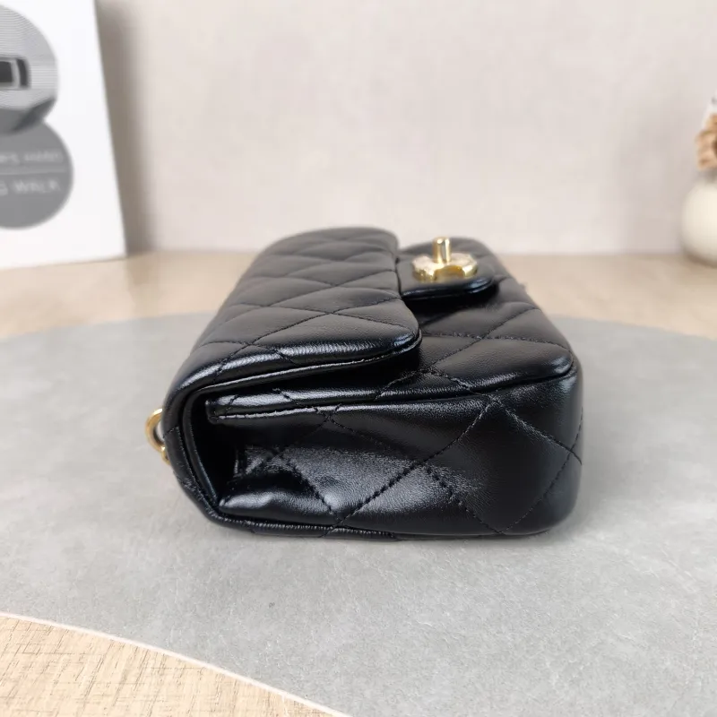 Chanel Crossbody Bag Black with Gold-Tone Hardware Lambskin Mini 18 × 5 × 12 cm — detail view 7 of 10