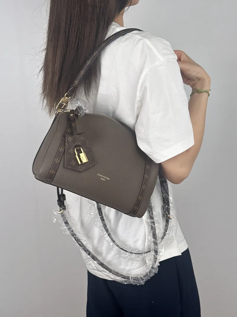 Louis Vuitton Shoulder Bag EXPRESS Shoulder Bag Grey Calfskin Small26 × 13.5 × 17 cm — on-model view 2 of 2