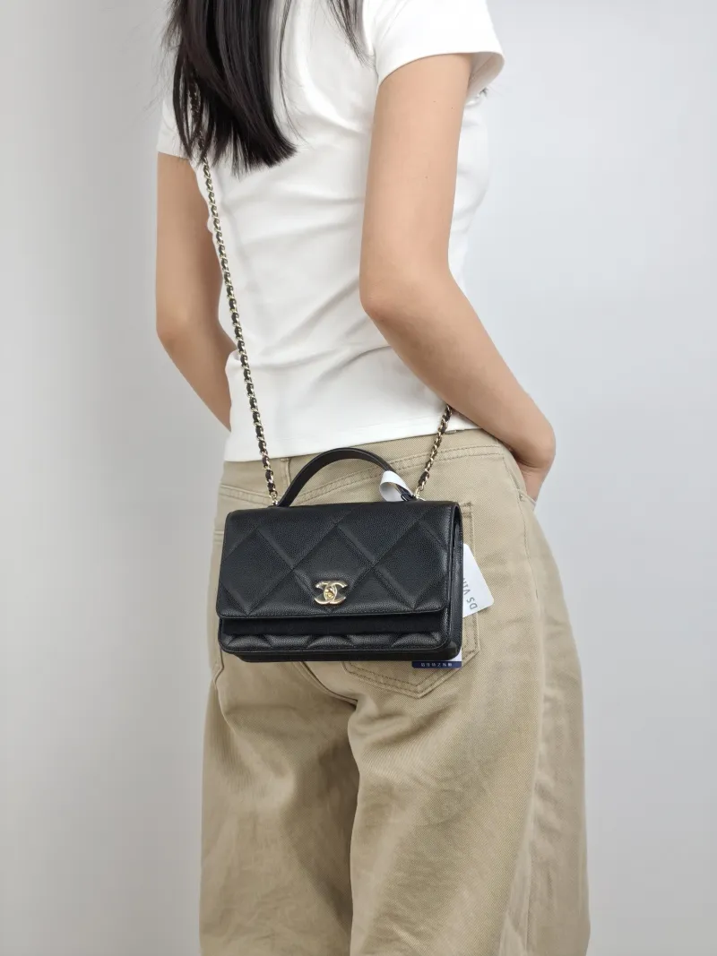 Chanel Crossbody Bag 25k woc Black Calfskin 19.2 × 3.5 × 12.3 cm — on-model view 2 of 2