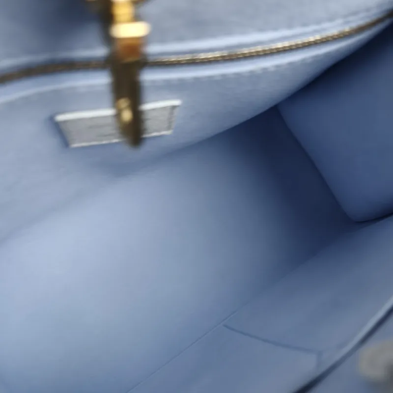 Louis Vuitton Shoulder Bag Onthego White · Blue Monogram Empreinte Embossed Calfskin Small 25 × 11.5 × 19 cm — detail view 10 of 11