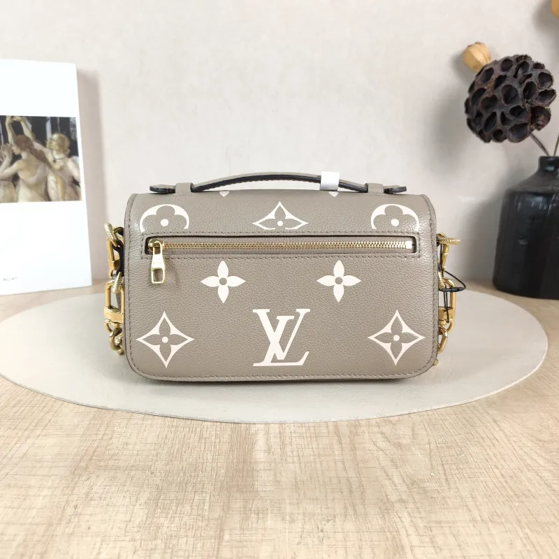 Louis Vuitton Crossbody Bag Pochette Métis East West Monogram Empreinte Embossed Calfskin Small 21.5 × 6 × 13.5 cm — cover view 4 of 6