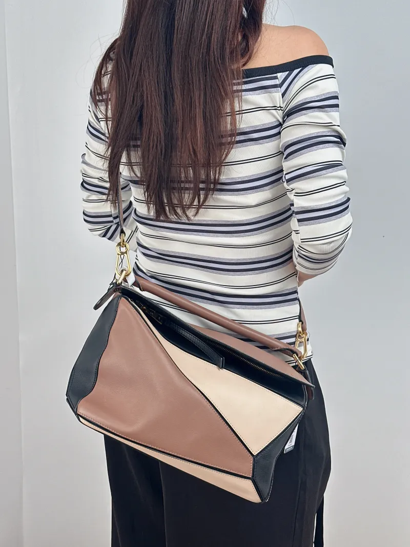 LOEWE Crossbody Bag Puzzle Brown Colorblock Calfskin Medium 29 × 14 × 19.5 cm — on-model view 1 of 2