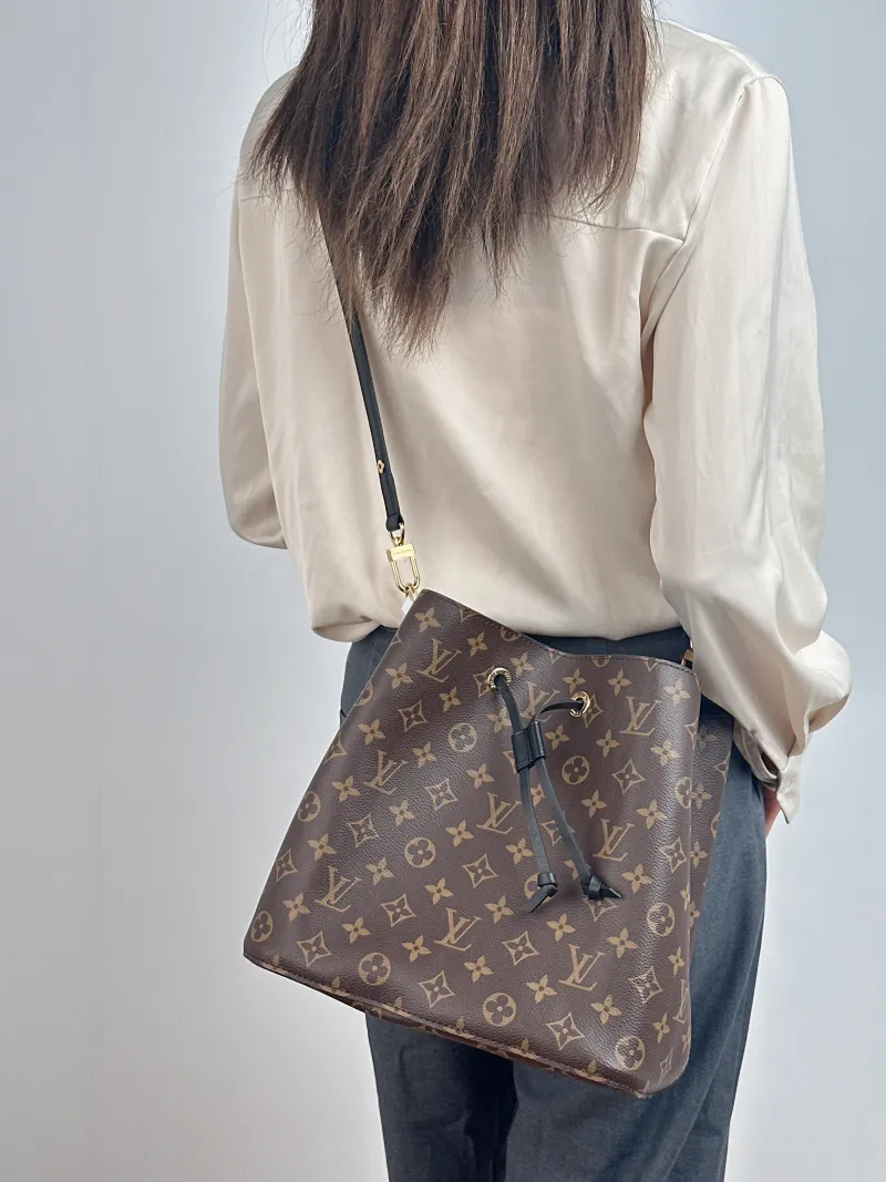 Louis Vuitton Shoulder Bag NÉONOÉ Bucket Bag Black PVC Medium 26 × 17.5 × 26 cm — on-model view 1 of 2