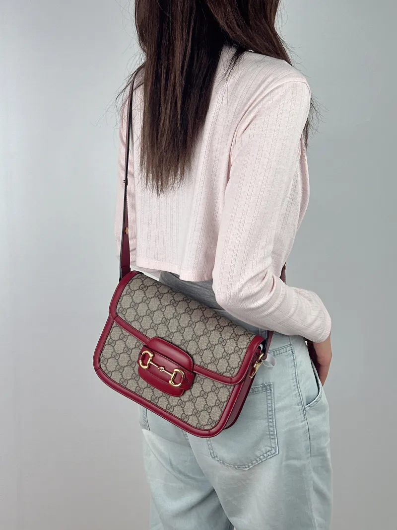 GUCCI Crossbody Bag Horsebit 1955 Horsebit Medium Red PVC Medium 25 × 8 × 18 cm — on-model view 2 of 2