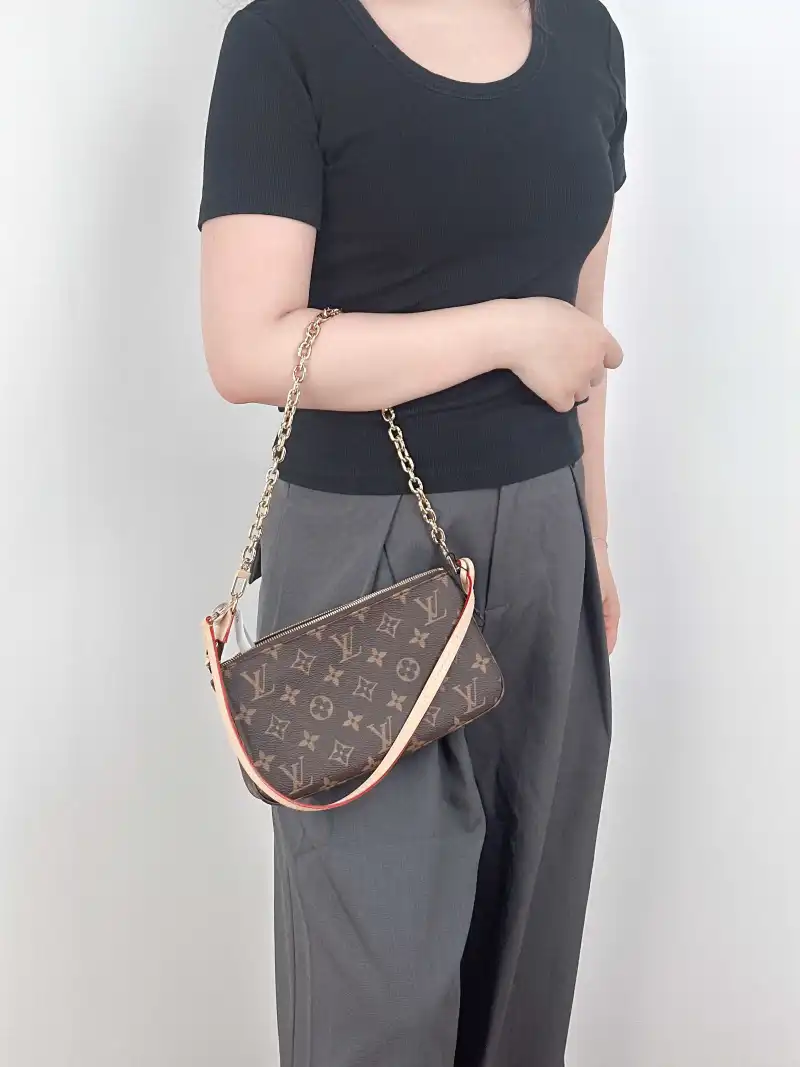 Louis Vuitton Shoulder Bag Pochette Accessoires Two Straps Monogram PVC Large 23.5 × 4 × 13.5 cm — on-model view 3 of 3