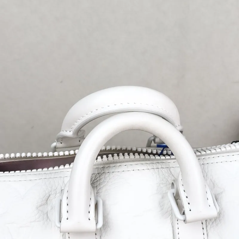 Louis Vuitton Crossbody Bag Keepall 25 White Calfskin Medium 25 × 11 × 15 cm — detail view 4 of 11