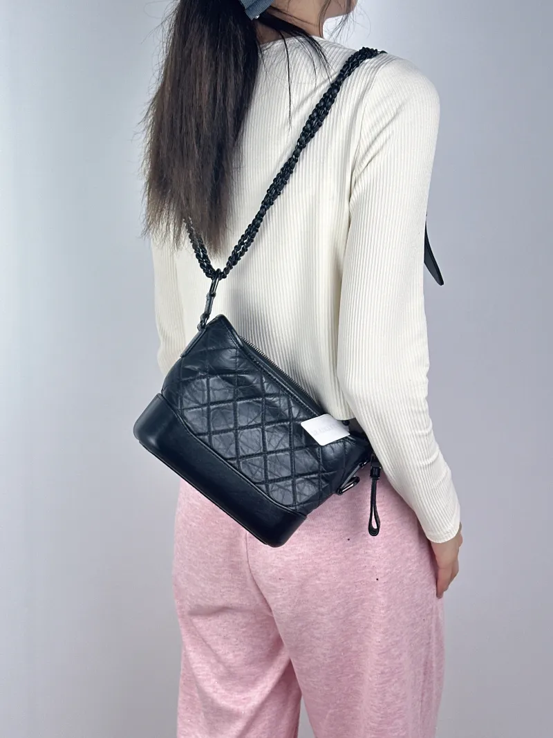 Chanel Crossbody Bag Gabrielle Gabrielle Bagsoblack Black Calfskin Small20 × 8 × 15 cm — on-model view 1 of 2