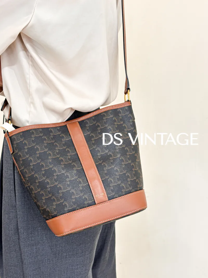 CELINE Crossbody Bag Triomphe Bucket Bag Monogram PVC Small22 × 13 × 26 cm — on-model view 2 of 3