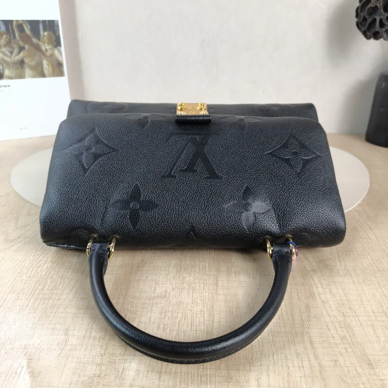 Louis Vuitton Crossbody Bag MADELEINE Black Monogram Empreinte Embossed Calfskin Medium 30 × 11 × 19.5 cm — detail view 11 of 12