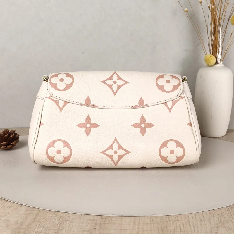 Louis Vuitton Crossbody Bag Favorite White · Pink Empreinte Embossed Calfskin Monogram Medium24 × 9 × 14 cm — cover view 3 of 5