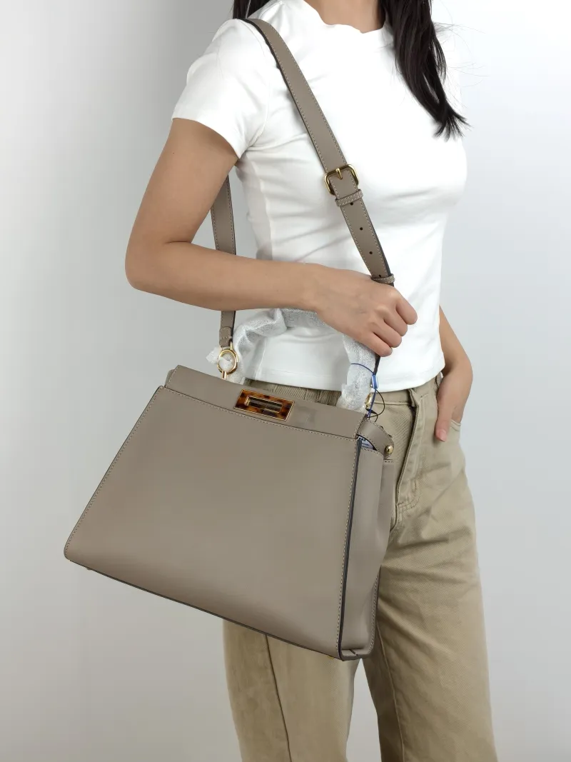 FENDI Top Handle Bag Peekaboo IS ee U Grey Calfskin Medium 33.5 × 13 × 25.5 cm — on-model view 1 of 2