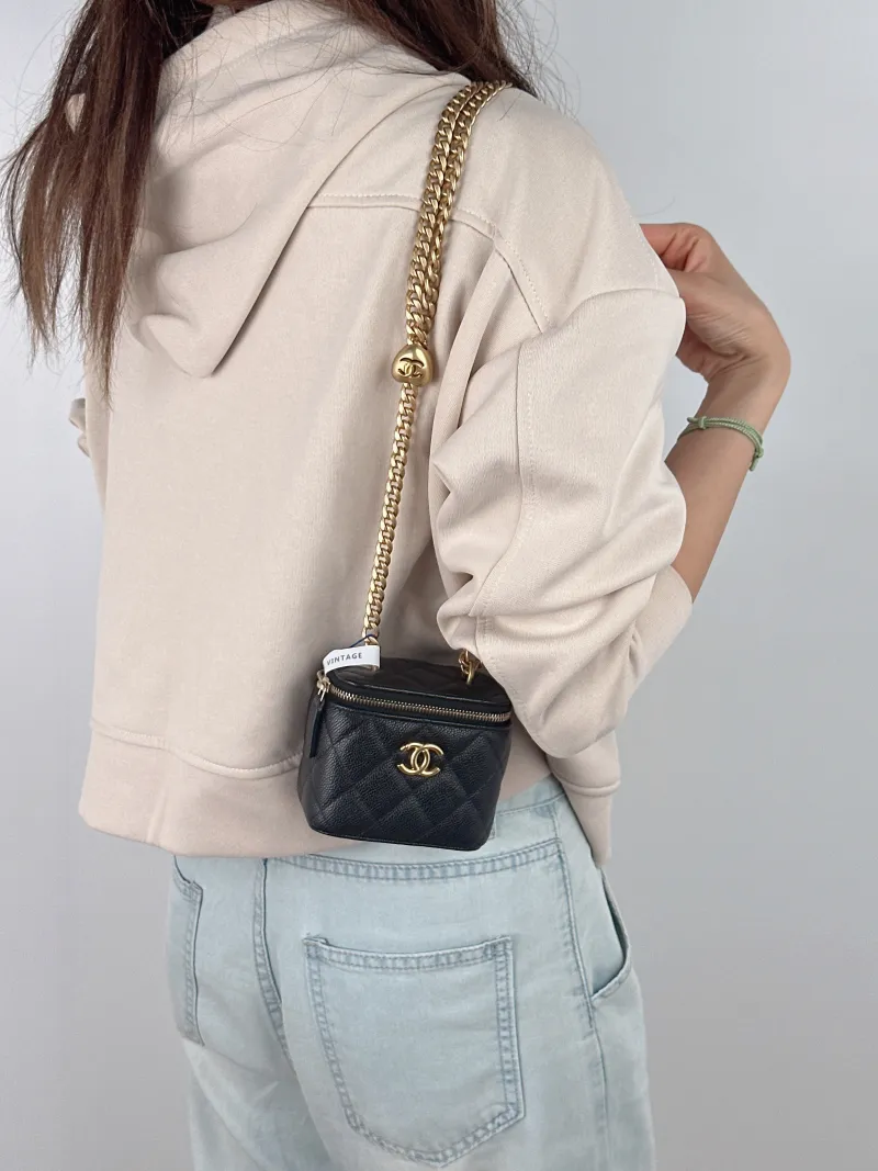 Chanel Crossbody Bag Edition Black Grained Calfskin nano 10 × 7 × 9 cm — on-model view 1 of 2