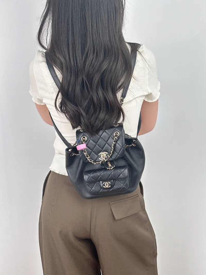 Chanel Backpack Duma Black Lambskin Small18 × 9.5 × 19 cm — on-model view 1 of 2