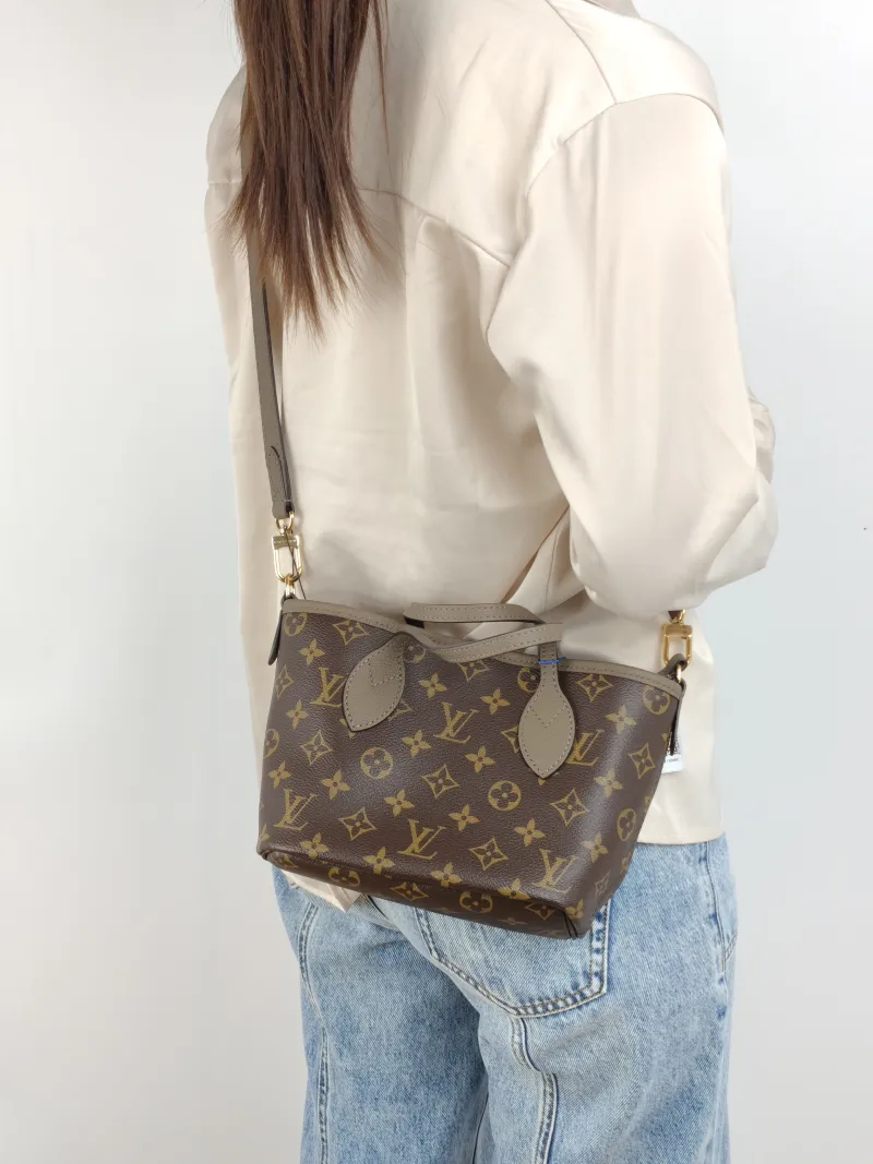 Louis Vuitton Crossbody Bag NEVERFULL INSIDE OUT BB PVC · Calfskin BB 26.5 × 11 × 16.5 cm — on-model view 2 of 2