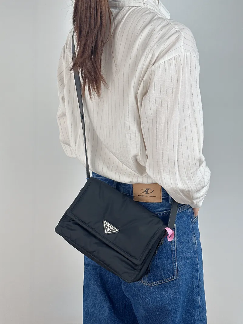 PRADA Shoulder Bag Re-Nylon Shoulder Bag Black Nylon 23 × 11 × 16 cm — on-model view 2 of 2