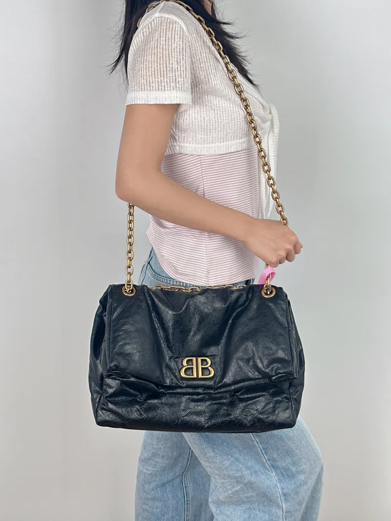 BALENCIAGA Shoulder Bag MONACO Chain Bag Black Calfskin Medium 34 × 15 × 24 cm — on-model view 3 of 3