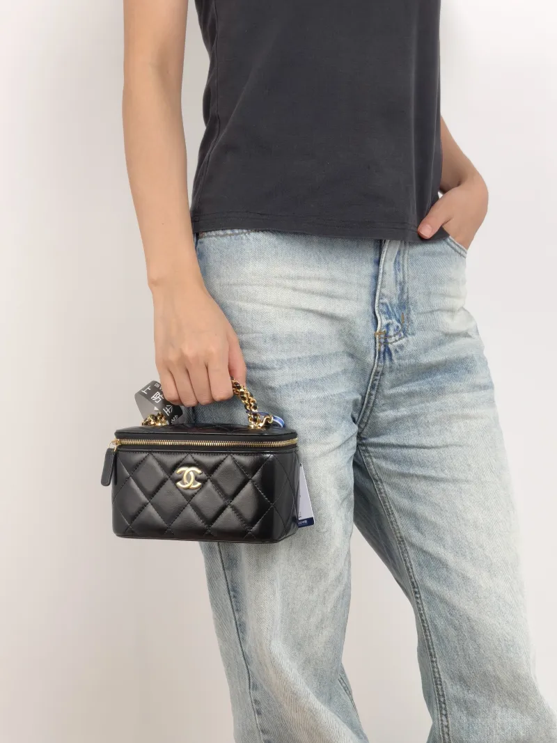Chanel Crossbody Bag Black Lambskin Mini 16 × 8 × 9.5 cm — on-model view 3 of 3