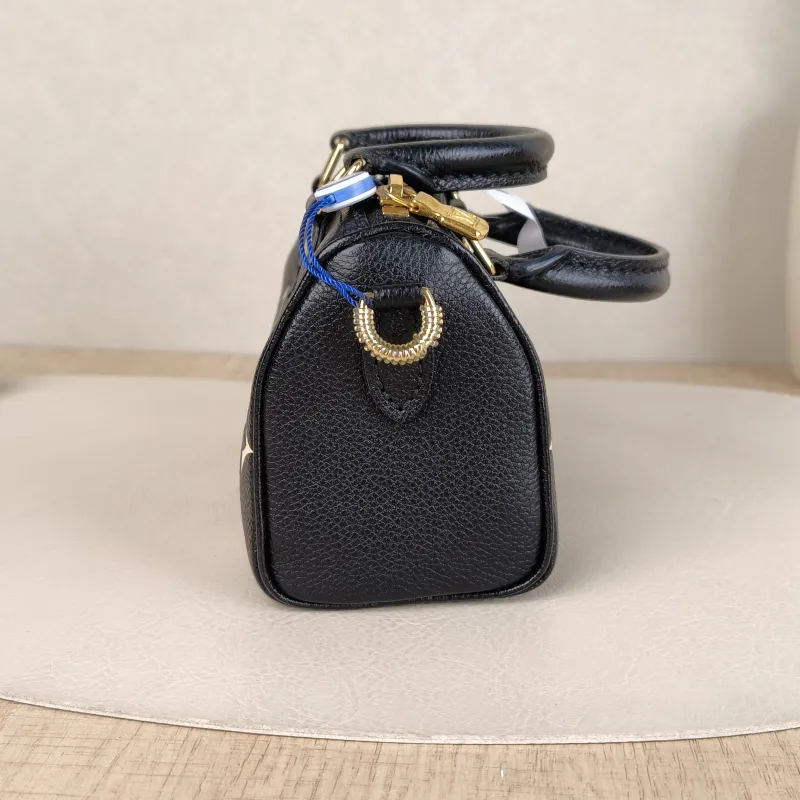 Louis Vuitton Crossbody Bag Speedy Nano Black · White Empreinte Embossed Calfskin Monogramnano16 × 7.5 × 10 cm — detail view 1 of 13