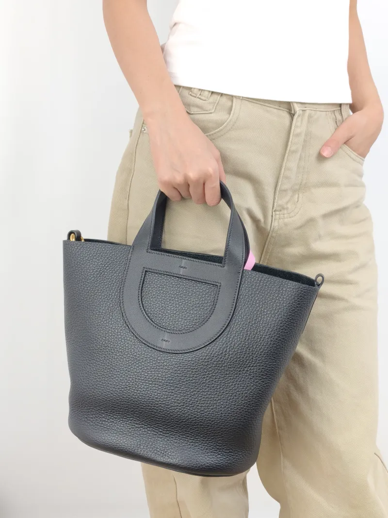 Hermès Top Handle Bag In-the-Loop 23 89Black Taurillon Clemence TC Calfskin Medium 23 × 15 × 25 cm B — on-model view 2 of 2