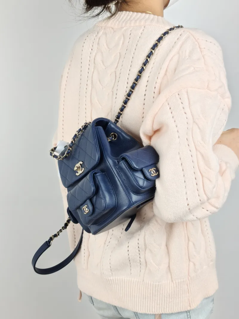 Chanel Backpack duma Navy Grained Calfskin Small 18 × 9.5 × 19 cm — on-model view 1 of 3
