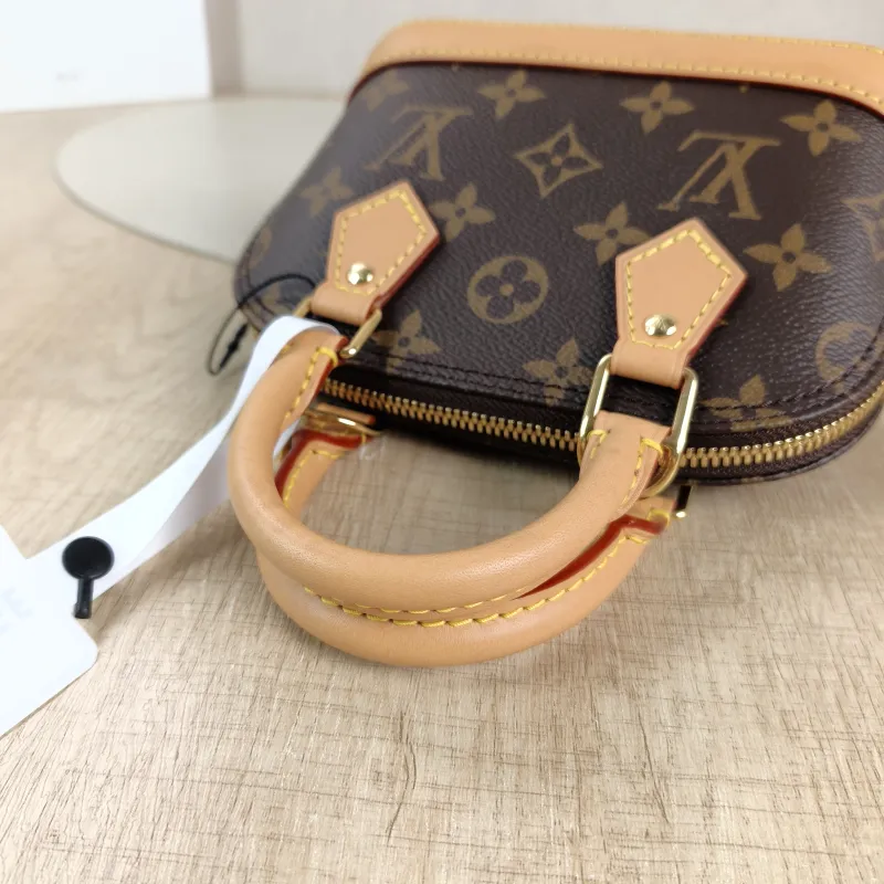 Louis Vuitton Crossbody Bag Alma Nano Monogram PVC nano 18 × 8 × 12 cm — detail view 8 of 12