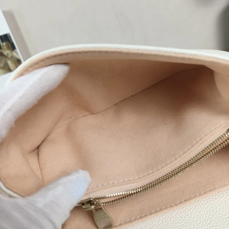 Louis Vuitton Crossbody Bag Pochette Métis East West White · Pink Monogram Empreinte Embossed Calfskin Small21.5 × 6 × 13.5 cm — detail view 4 of 13