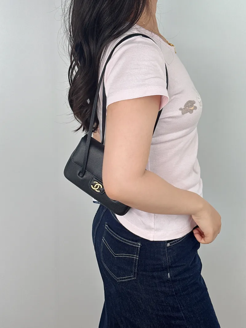 Chanel Crossbody Bag preppy coco Black Grained Calfskin Mini 17 × 5 × 11.5 cm — on-model view 1 of 2