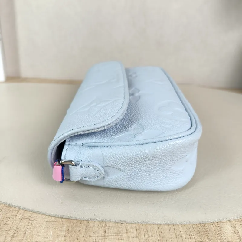 Louis Vuitton Crossbody Bag IVY Blue Empreinte Embossed Calfskin Small 23.5 × 4.3 × 12 cm — detail view 3 of 13