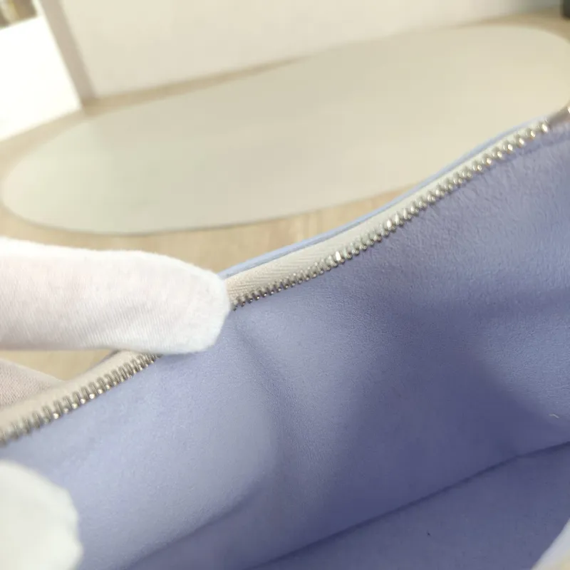 Louis Vuitton Crossbody Bag Boulogne White · Calfskin nano 19 × 8 × 13 cm — detail view 6 of 10