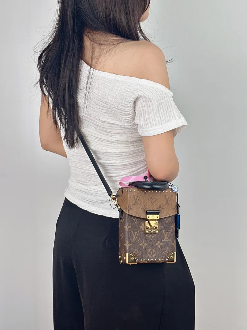 Louis Vuitton Crossbody Bag Camera Box Camera Bag Box Bag Monogram PVC One Size 12.5 × 6 × 18 cm — on-model view 1 of 2