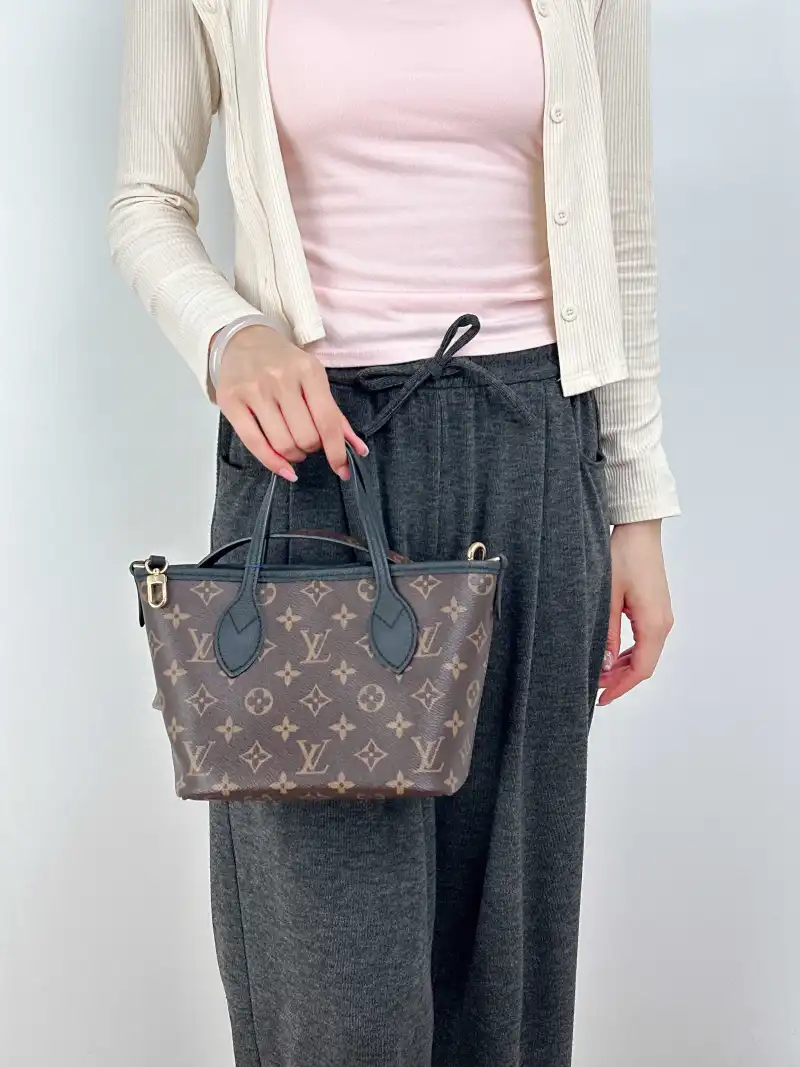 Louis Vuitton Crossbody Bag NEVERFULL INSIDE OUT BB Black PVC · Calfskin BB26.5 × 11 × 16.5 cm — on-model view 1 of 3