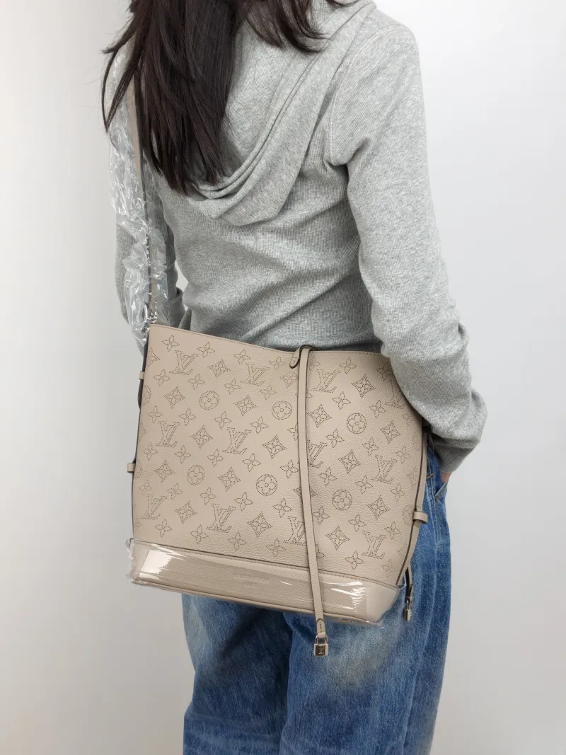 Louis Vuitton Shoulder Bag Flore Bucket Bag Grey Calfskin One Size 28 × 10 × 27 cm — on-model view 1 of 2